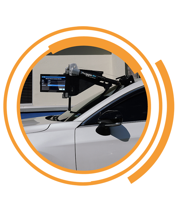 AirPro's Auggie Air device on a vehicle windshield